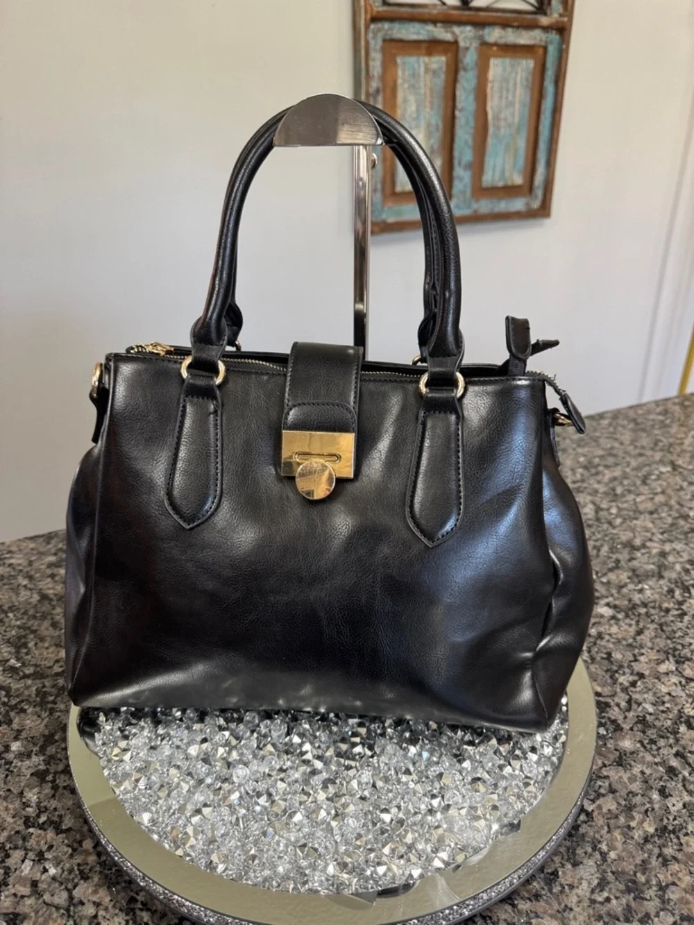 Women's Black Leather Satchel with Gold-Tone Lock and crossbody strap EUC